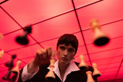 Person Playing Chess